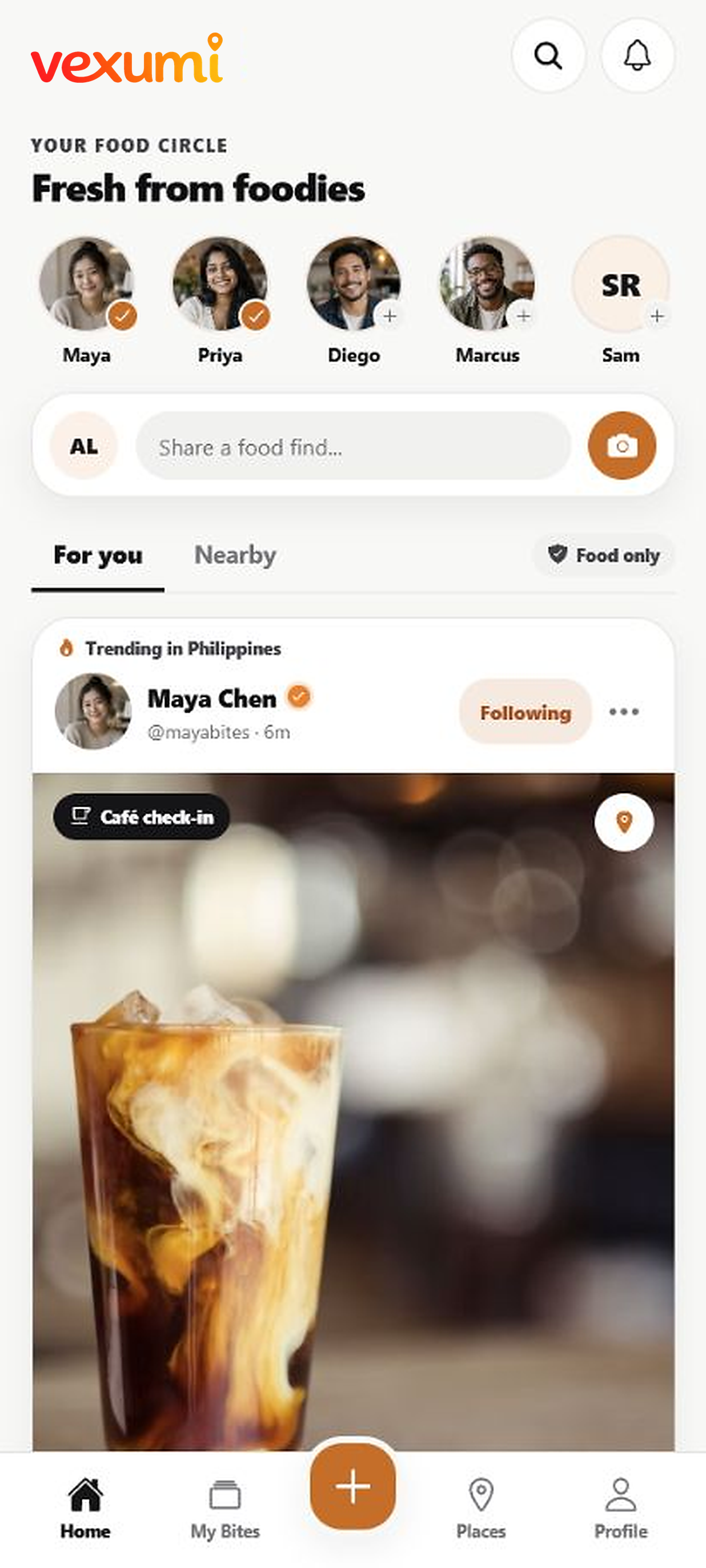 VEXUMI mobile app home feed showing foodies, a cafe check-in, and the main navigation